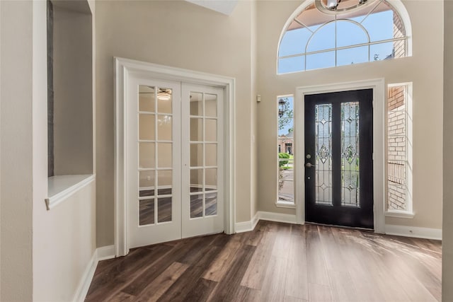 3515 Emerald Falls Ct, Houston, TX 77059 - entrance foyer with wood finished floors, baseboards, and french doors