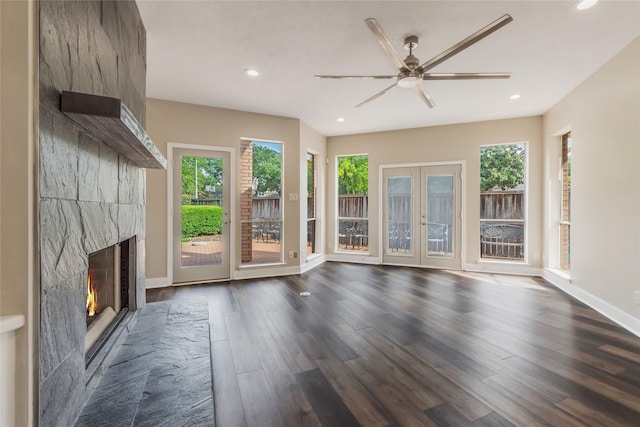 3515 Emerald Falls Ct, Houston, TX 77059 - unfurnished living room featuring dark wood-style floors, a large fireplace, french doors, recessed lighting, and a ceiling fan