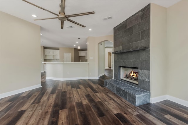 3515 Emerald Falls Ct, Houston, TX 77059 - unfurnished living room featuring a ceiling fan, a fireplace, dark wood-type flooring, recessed lighting, and baseboards