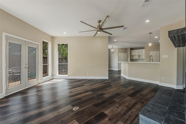 3515 Emerald Falls Ct, Houston, TX 77059 - unfurnished living room with a ceiling fan, dark wood-style flooring, french doors, recessed lighting, and baseboards