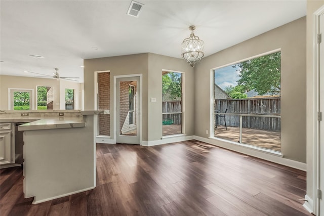 3515 Emerald Falls Ct, Houston, TX 77059 - kitchen featuring plenty of natural light, baseboards, and dark wood finished floors