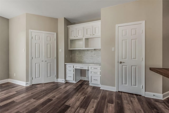 3515 Emerald Falls Ct, Houston, TX 77059 - unfurnished office with built in desk, dark wood finished floors, and baseboards