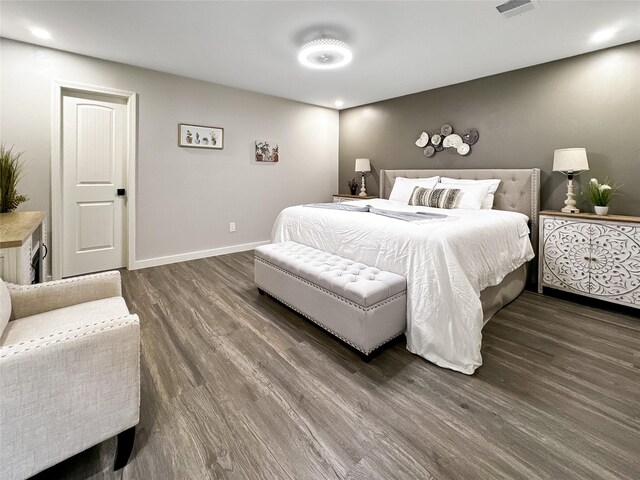 6803 Las Brisas Dr, Houston, TX 77083 - bedroom with baseboards and dark wood finished floors