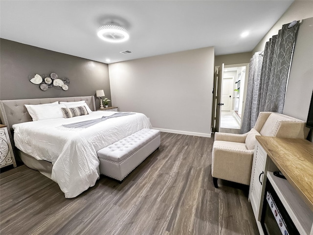 6803 Las Brisas Dr, Houston, TX 77083 - bedroom with baseboards, visible vents, and dark wood-type flooring