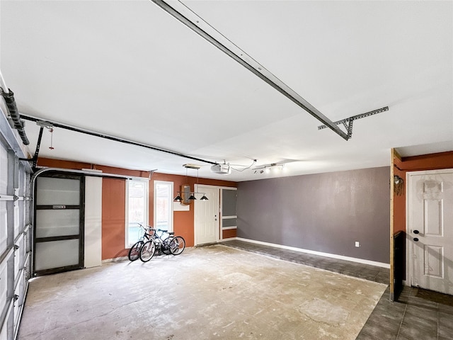 6803 Las Brisas Dr, Houston, TX 77083 - garage featuring a garage door opener