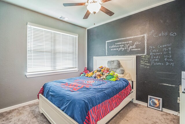 bedroom featuring carpet floors, a ceiling fan, baseboards, and visible vents