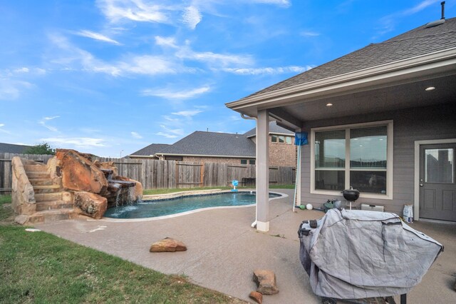 view of swimming pool featuring a patio, a fenced backyard, and a fenced in pool