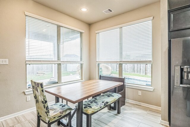dining space featuring recessed lighting, baseboards, and visible vents
