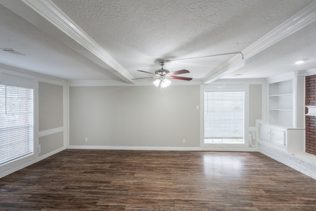 unfurnished living room with a textured ceiling, a wealth of natural light, and wood finished floors