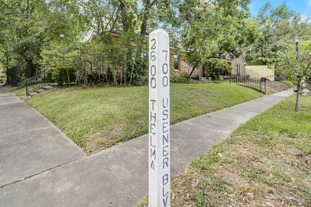 exterior details featuring fence