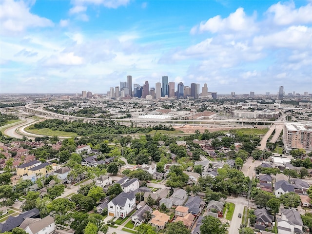 drone / aerial view featuring a city view