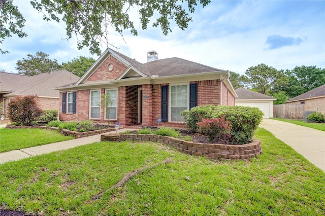 view of front of home featuring driveway, a chimney, a front yard, a garage, and brick siding