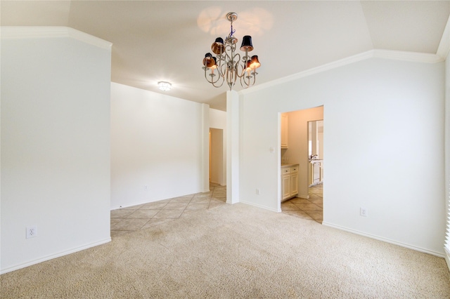 empty room with baseboards, light carpet, lofted ceiling, and a chandelier
