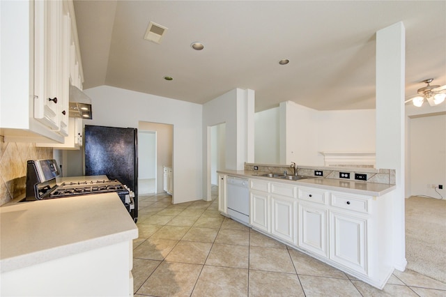 kitchen with visible vents, dishwasher, light countertops, ventilation hood, and stainless steel range with gas cooktop