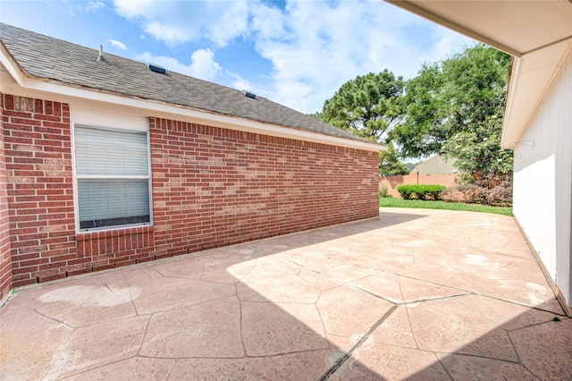 view of patio with fence