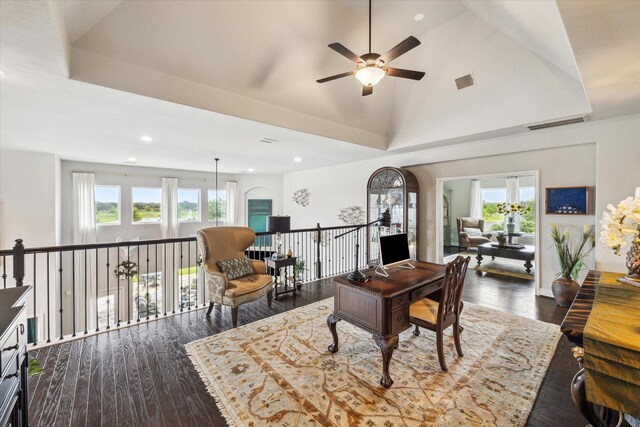 living area with a wealth of natural light, a ceiling fan, recessed lighting, and visible vents