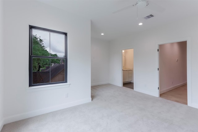 unfurnished bedroom featuring carpet floors, recessed lighting, baseboards, and visible vents