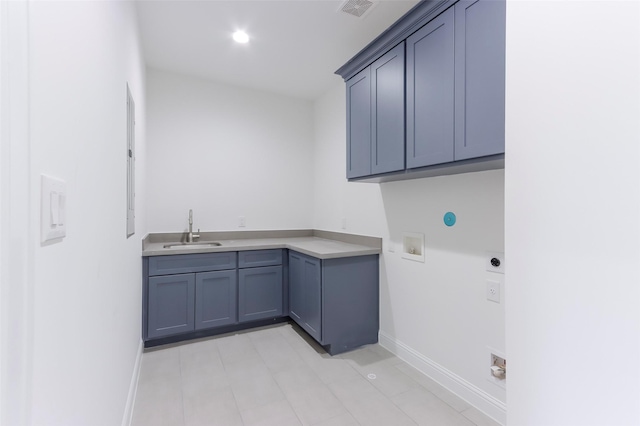 laundry area featuring visible vents, hookup for a washing machine, electric dryer hookup, a sink, and cabinet space