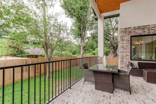 balcony featuring outdoor dining space