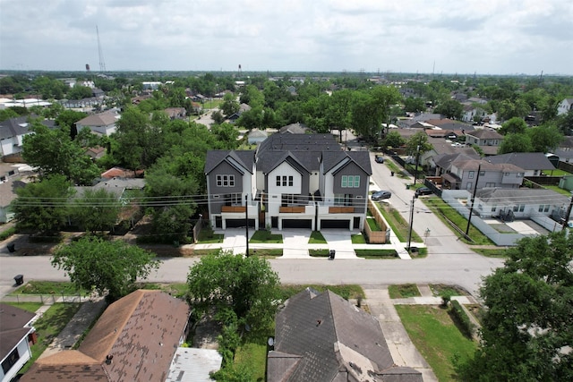 birds eye view of property with a residential view