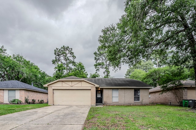 4523 Towergate Dr, Spring, TX 77373 - ranch-style house featuring brick siding, a garage, driveway, and a front lawn