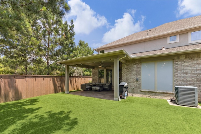 26 Heirloom Garden Pl, Magnolia, TX 77354 - view of yard with a ceiling fan, central AC unit, outdoor lounge area, and a patio