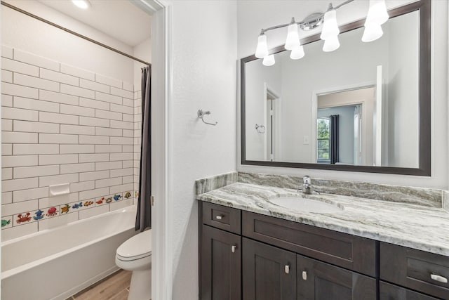 26 Heirloom Garden Pl, Magnolia, TX 77354 - bathroom with vanity, wood finished floors, toilet, and shower / bath combo with shower curtain