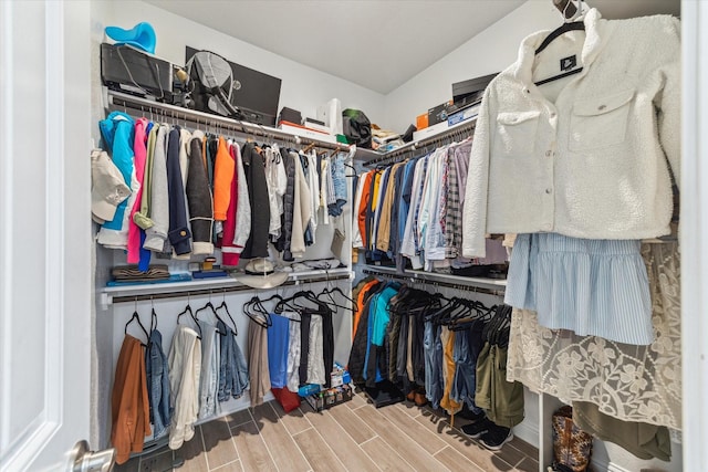 26 Heirloom Garden Pl, Magnolia, TX 77354 - spacious closet featuring wood finished floors