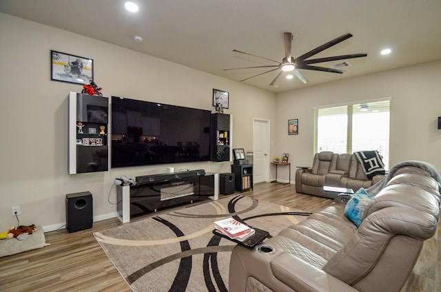 12630 Beddington Ct, Tomball, TX 77375 - living room featuring ceiling fan, visible vents, wood finished floors, baseboards, and recessed lighting