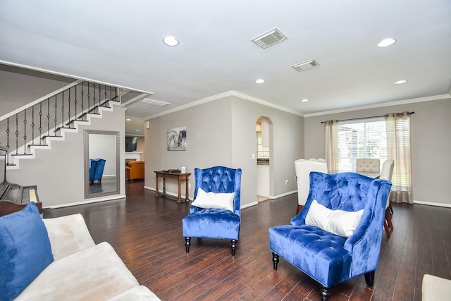7318 River Garden Dr, Houston, TX 77095 - living area featuring visible vents, arched walkways, baseboards, and crown molding