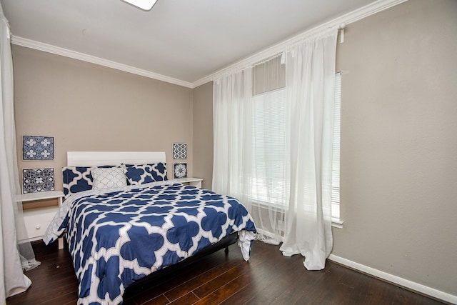 7318 River Garden Dr, Houston, TX 77095 - bedroom with crown molding, baseboards, and wood finished floors