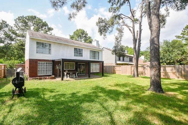7318 River Garden Dr, Houston, TX 77095 - rear view of house featuring a patio, a fenced backyard, and a yard