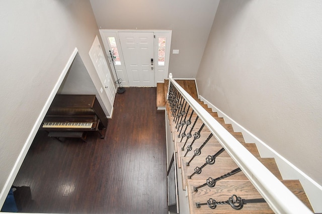 7318 River Garden Dr, Houston, TX 77095 - foyer featuring baseboards, stairs, and wood finished floors