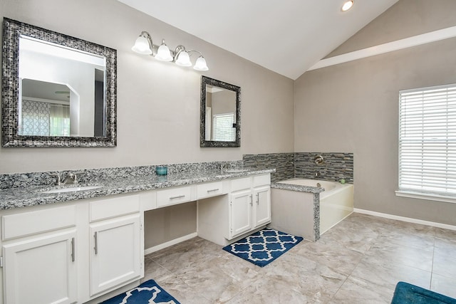 7318 River Garden Dr, Houston, TX 77095 - full bathroom featuring double vanity, a sink, a garden tub, and lofted ceiling