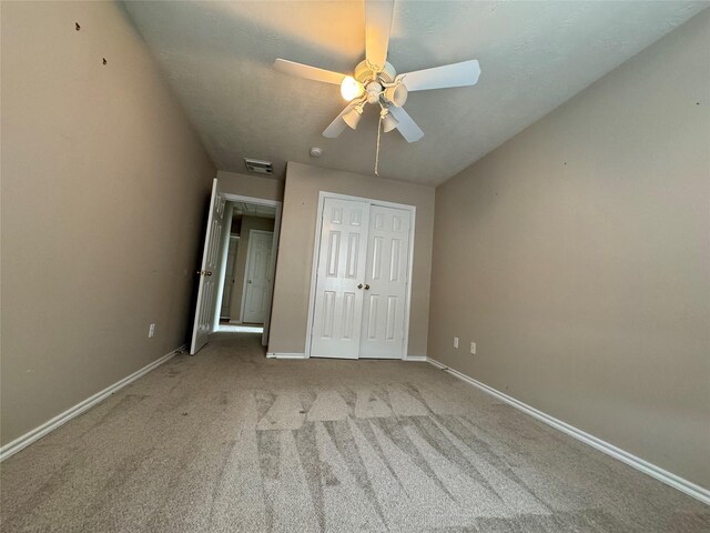 16407 Thyme Green Ln, Cypress, TX 77433 - unfurnished bedroom with carpet floors, baseboards, a closet, and a ceiling fan