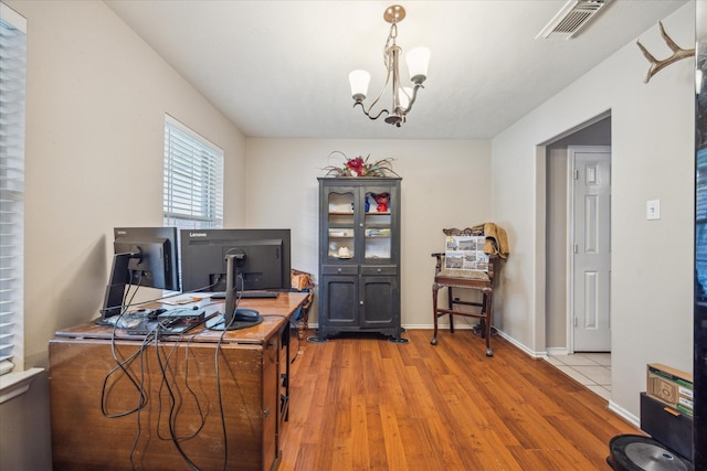16407 Thyme Green Ln, Cypress, TX 77433 - office with wood finished floors, a chandelier, and baseboards