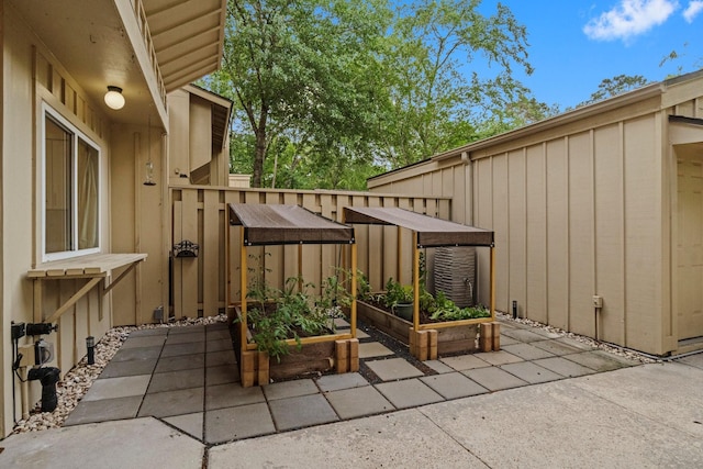 view of patio / terrace featuring a vegetable garden