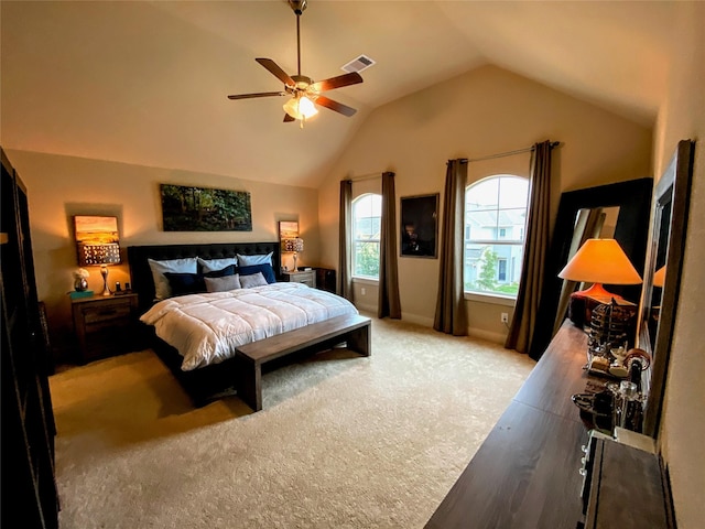 bedroom featuring ceiling fan, visible vents, and vaulted ceiling