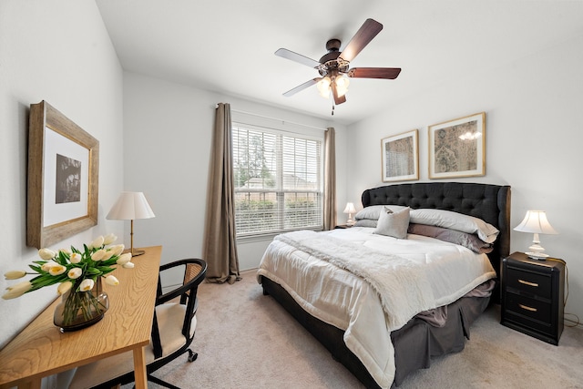 bedroom featuring ceiling fan and light colored carpet
