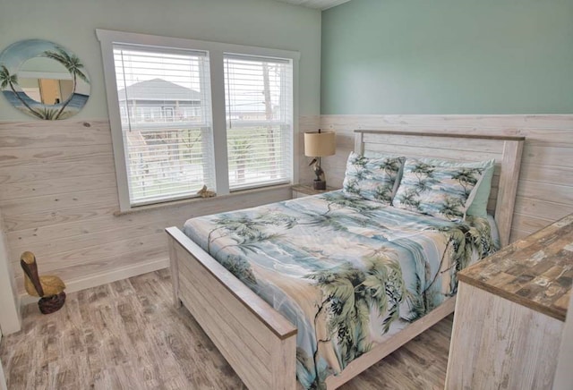 517 Private Road 675, Sargent, TX 77414 - bedroom featuring wood finished floors