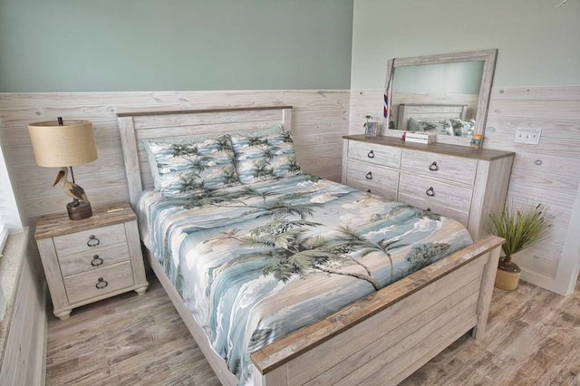 517 Private Road 675, Sargent, TX 77414 - bedroom featuring light wood-style floors