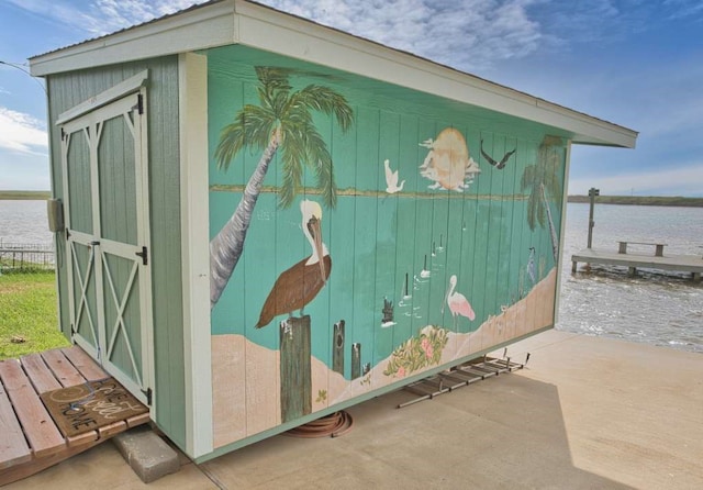 517 Private Road 675, Sargent, TX 77414 - view of outbuilding with an outdoor structure and a water view