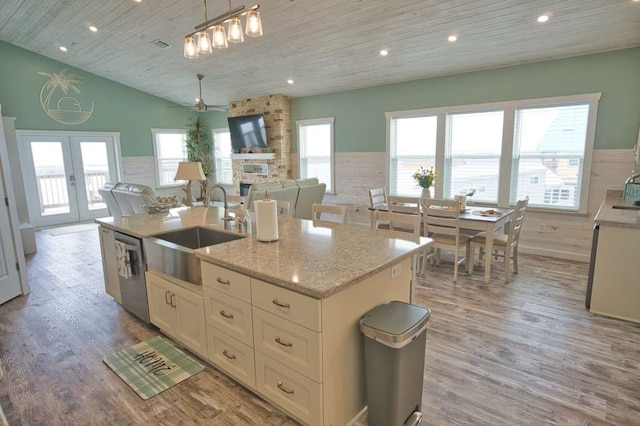 517 Private Road 675, Sargent, TX 77414 - kitchen with wood ceiling, dishwasher, a sink, light wood finished floors, and lofted ceiling