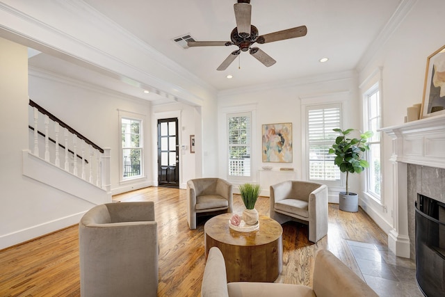 806 Waverly St, Houston, TX 77007 - living area with plenty of natural light, ceiling fan, visible vents, and stairway