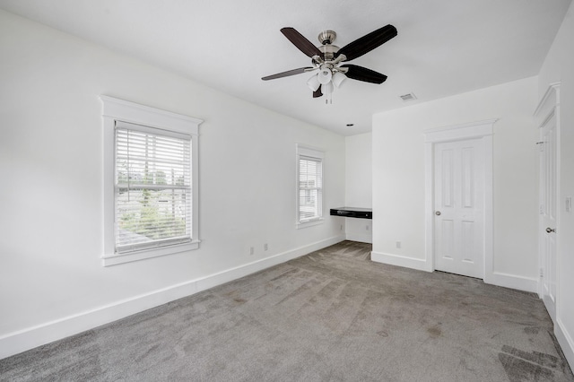 806 Waverly St, Houston, TX 77007 - unfurnished bedroom featuring baseboards, carpet flooring, ceiling fan, and visible vents