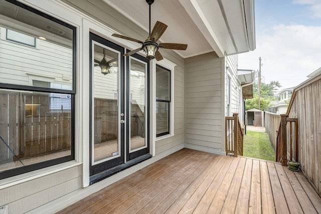 806 Waverly St, Houston, TX 77007 - deck featuring a storage shed, an outbuilding, ceiling fan, and a fenced backyard