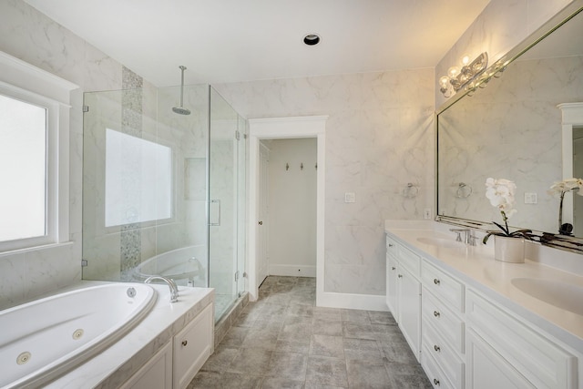 806 Waverly St, Houston, TX 77007 - bathroom featuring a whirlpool tub, double vanity, a sink, and a shower stall