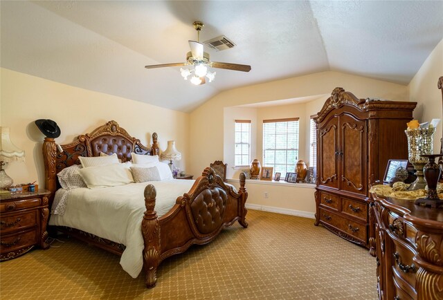 carpeted bedroom with baseboards, visible vents, a ceiling fan, and lofted ceiling