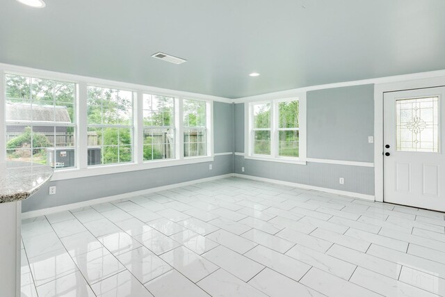 foyer featuring recessed lighting, baseboards, marble finish floor, and visible vents