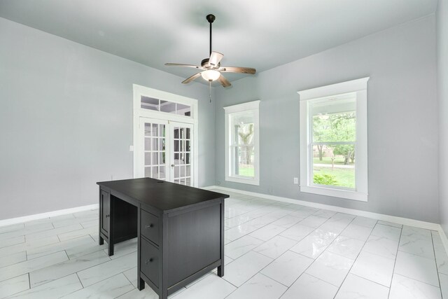 interior space with ceiling fan, french doors, and marble finish floor